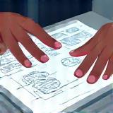 Designer sketching ideas on a board.