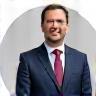 Portrait of Mr. Hans Müller, CEO of Swiss Manufacturing AG.